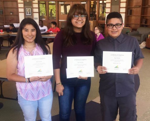 Youth with certificates from Youth Power Academy & Teen Money Camps